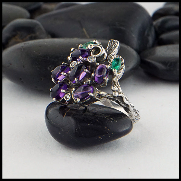 Custom Grape ring in Sterling Silver, set with oval Amethyst Cabochons, Marquise Emeralds, and diamonds. 