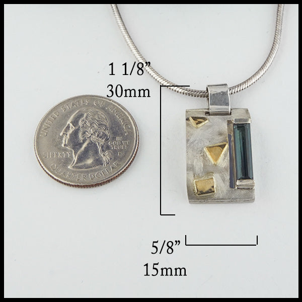 Pendant measures 1 1/8" by 5/8"