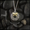 Ce;ltic wreath with gold bow measures 21mm by 19mm