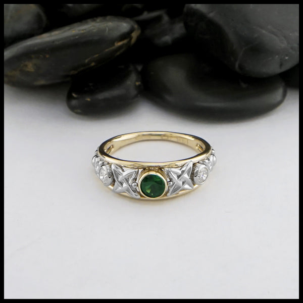 Green Tsavorite custom ring in 14K Yellow and White Gold and set with a Green Tsavorite and 3mm Diamonds.