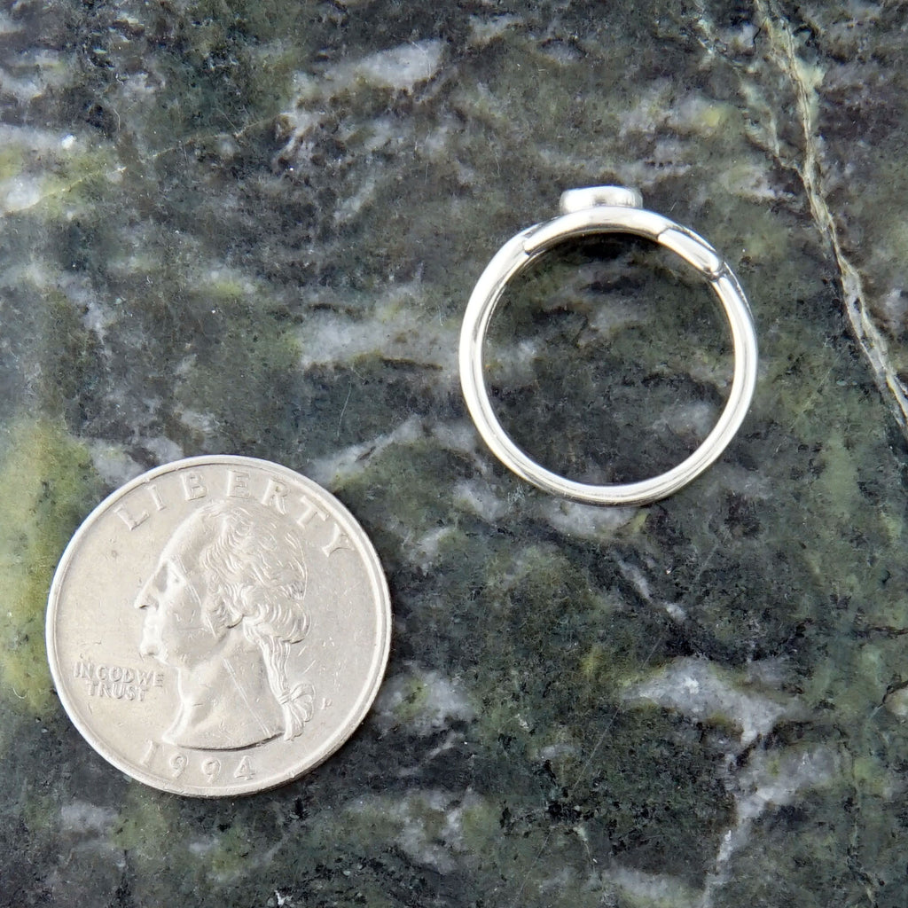 Celtic Fiona Knot Ring compared to a quarter