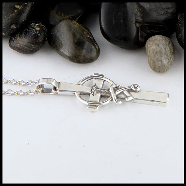 Small caring cross in sterling silver