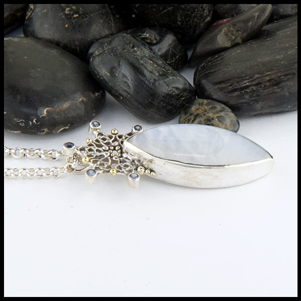 profile view of Moonstone and Sapphire Celtic Snowflake Pendant