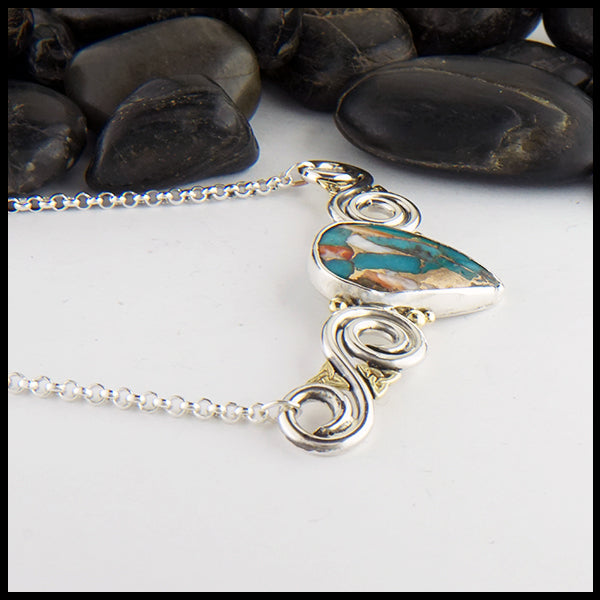 Profile view of Oyster Turquoise Bar Pendant in silver and gold
