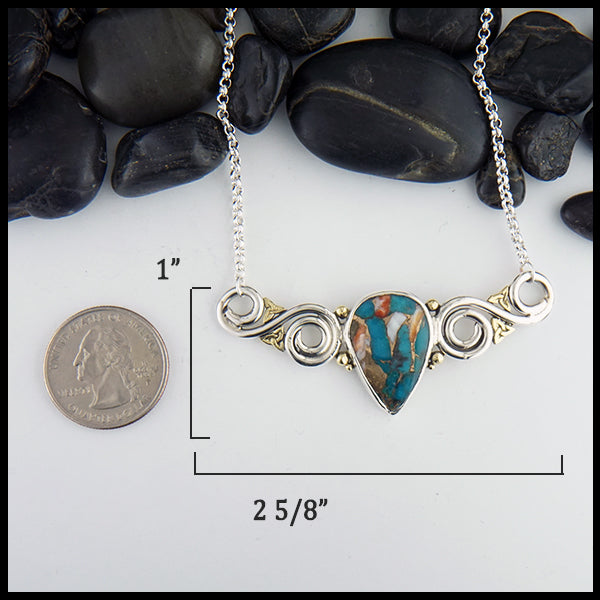 Pendant measures 1" by 2 5/8"