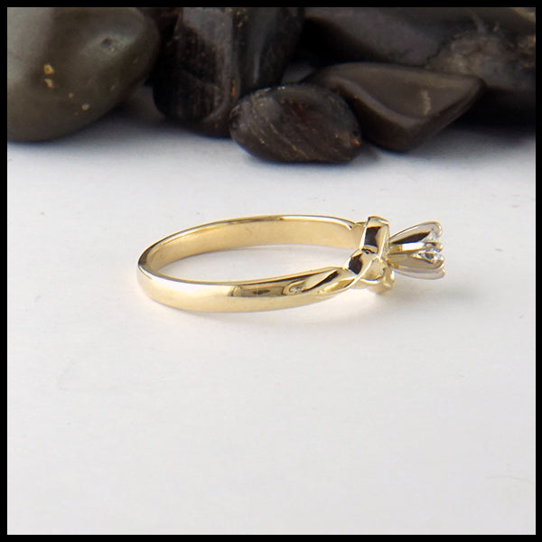Profile view of Trinity knot ring with reclaimed diamond
