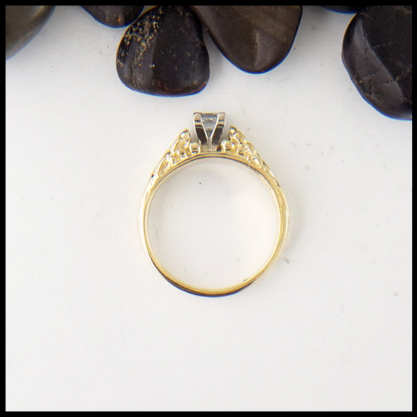 Profile view of shamrock ring in gold
