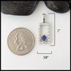Pendant measures 1" by 3/8"