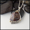 Boulder Opal and Heart Knot Pendant in Sterling Silver and 18K Yellow gold