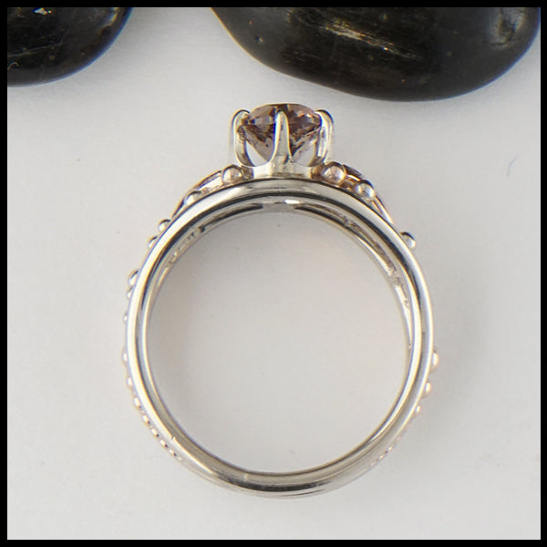 Profile view of Malaya Garnet ring in 14K Rose and White gold