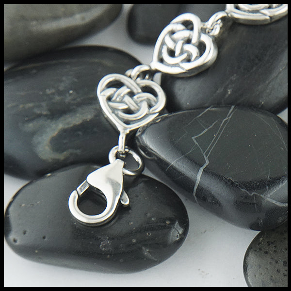Clasp on sterling silver heart link bracelet