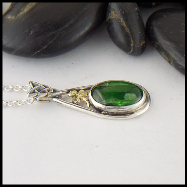 Profile view of Chrome Diopside Pendant with 18K Yellow Shamrock
