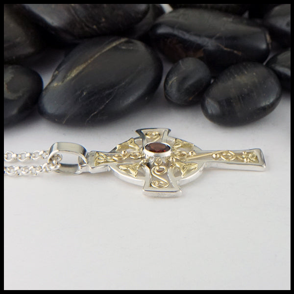 Profile view of Large Celtic Cross in Sterling silver and 18K Yellow gold with Garnet