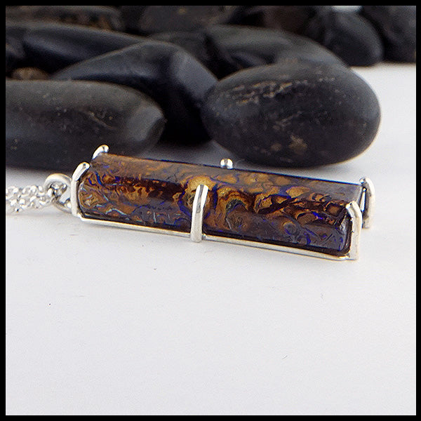 Profile view of Boulder Opal Pine Tree  Pendant