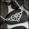 blue topaz heart knot