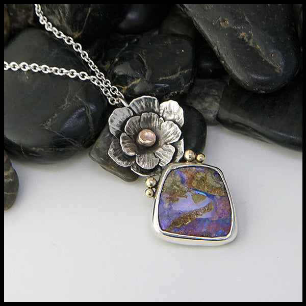 Floral pendant in sterling silver, 14K rose gold, 18K yellow gold with Australian opalized wood. 