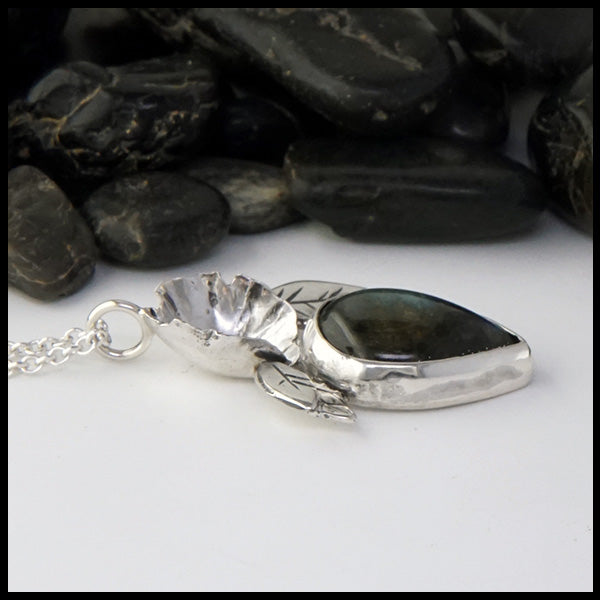 Profile view of Custom Sterling Silver and 14K Rose Gold Floral Pendant with Labradorite