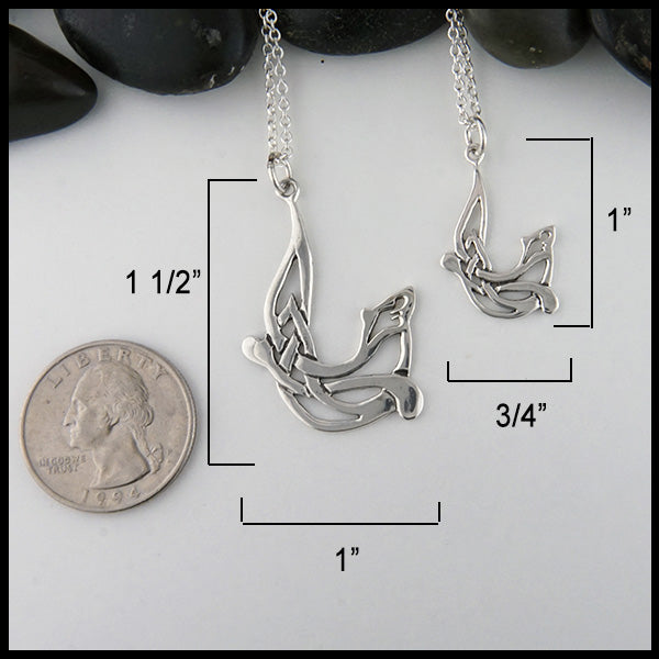 Large Otter dimensions 1 1/2 inch long by 1 inch wide.  Small Otter 1 inch long by 3/4 inch wide