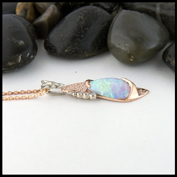 Profile View of custom opal and rose gold pendant