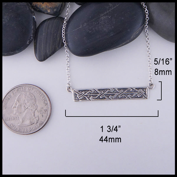 Key Pattern Bar Necklace measures 1 3/4" by 5/16"