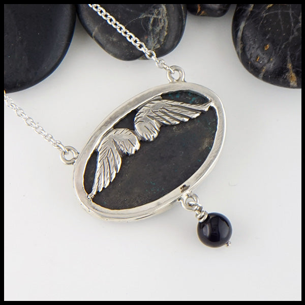 Reverse view of sterling silver wings on back of Azurite and Onyx wing pendant 
