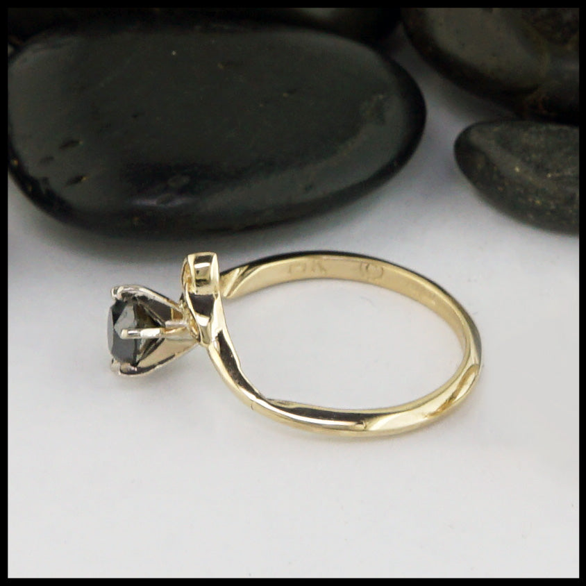 one ring with the black diamond and trinity knot 