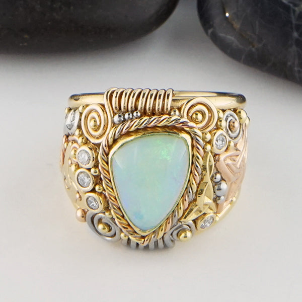 Ethiopian Opal Ring in yellow, rose, and white gold