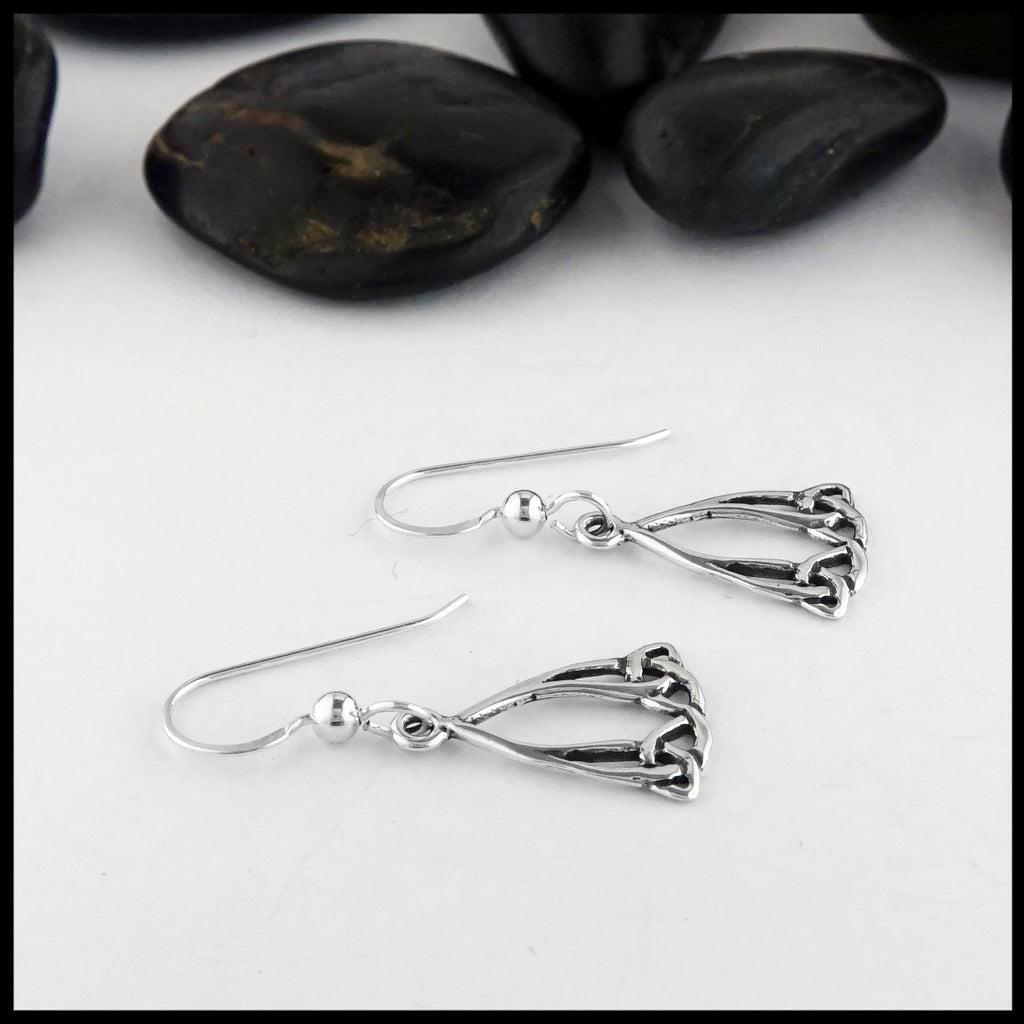 side view of trinity knot earrings 