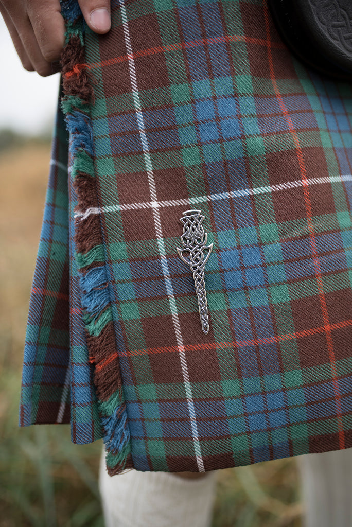 Scottish Thistle kilt pin on plaid