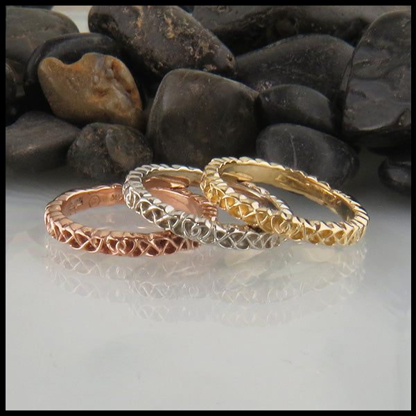 Heart knot stacking rings in 14K Rose, White, and Yellow Gold