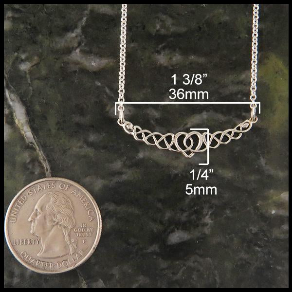 Celtic Heart Knot Bar Necklace measures 1/4" by 1 3/8"