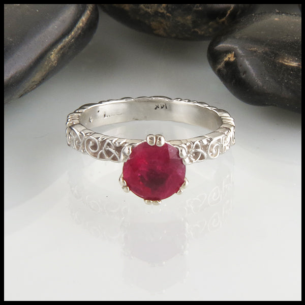 Ruby Solitaire on a Trinity Scroll Band in 14K White Gold