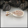 Reverse view of Crazy Lace Agate Paisley and Flower Pendant