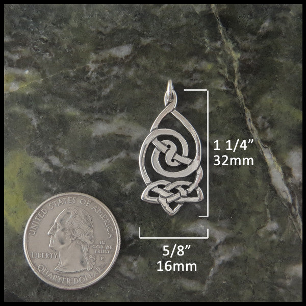 Corryvreckan pendant in Sterling Silver measures 1 1/4" by 5/8"