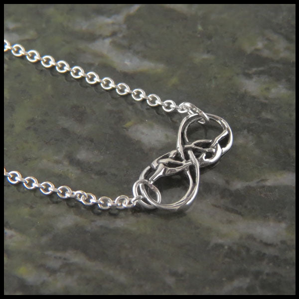 Infinity Knot pendant in Sterling Silver custom designed by Walker Metalsmiths