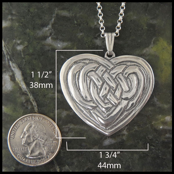 Heart Knot pendant in Sterling Silver measures 1 1/2" by 1 3/4"