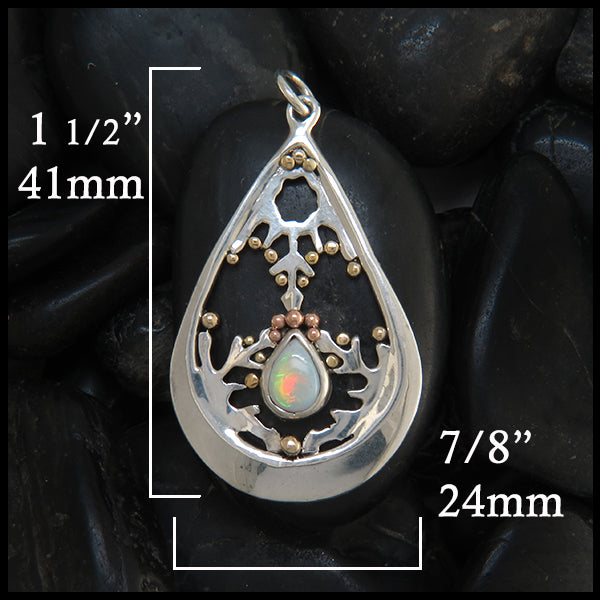 Frozen Opal Teardrop Pendant in silver and gold measures 1 1/2" by 7/8"