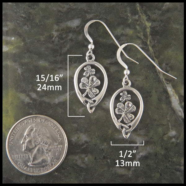 Silver shamrock earrings measure 15/16" by 1/2"