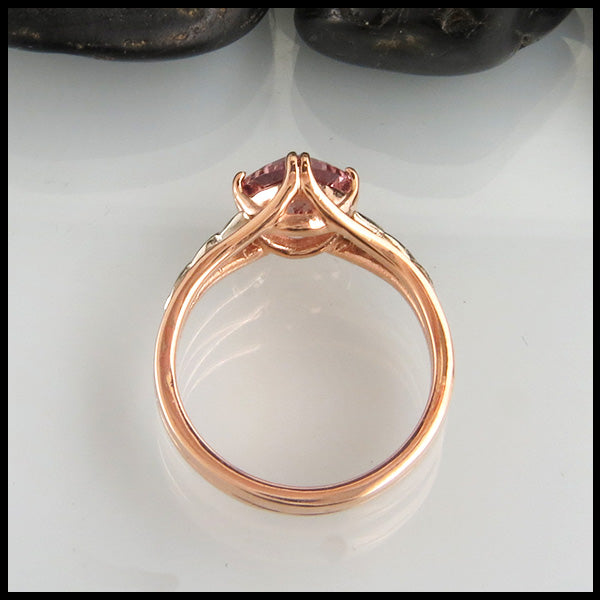 Profile view of malaya garnet ring