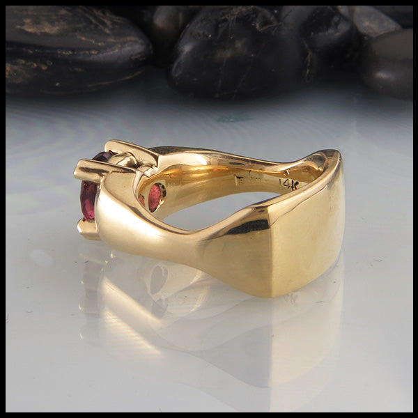 Profile view of Rhodolite Garnet ring in yellow gold