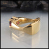 Profile view of Rhodolite Garnet ring in yellow gold