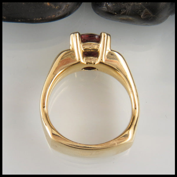 Profile view of rhodolite garnet ring