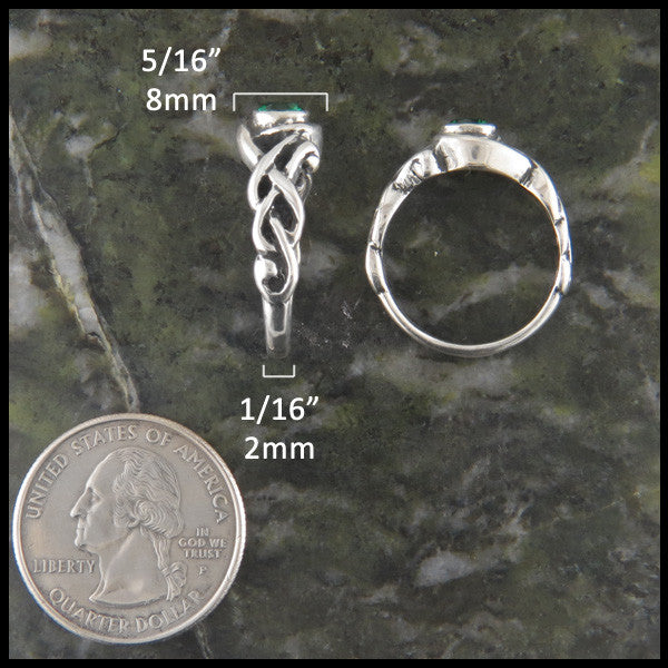 Birthstone Celtic Knot Ring in Sterling Silver measures 5/16" at widest point and 1/16" at band