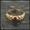 Garnet Spiral Knot Celtic Ring with Gemstones in 14K Gold