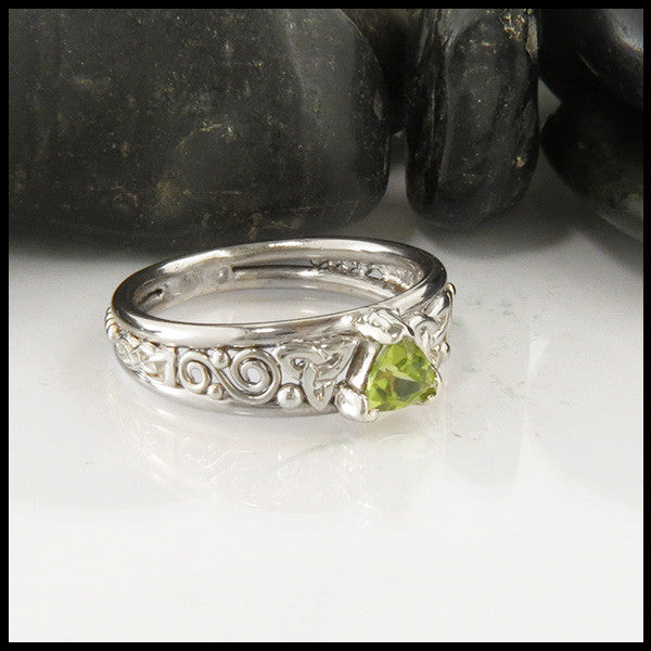 Trilliant Peridot Celtic Ring in White Gold