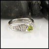 Trilliant Peridot Celtic Ring in White Gold