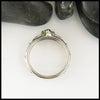 Trilliant Peridot Celtic Ring in White Gold