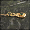 Tsavorite pendant in 14K gold