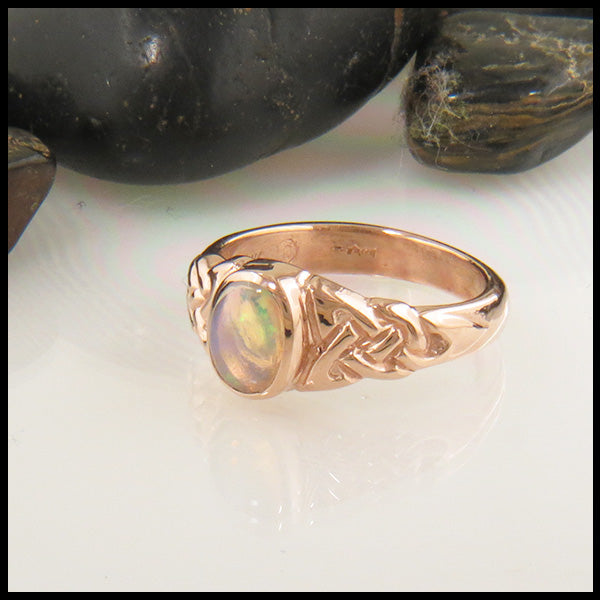 Celtic Trinity Ring with Oval Opal in Gold