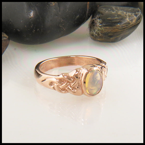 Celtic Trinity Ring with Oval Opal in Gold